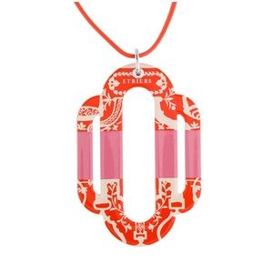 Enamel Hermes Attelage Etriers Tattoo Pendant on iconic Hermes orange chord.